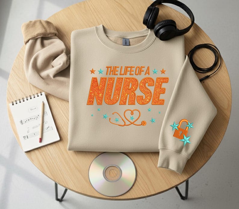 Embroidered The Life of a Nurse Sweatshirt, Nurse Showgirl Shirt, Orange Glitter Shirt, Nurse Appreciation Gift